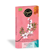 Laden Sie das Bild in den Galerie-Viewer, Chocolate Organiko Milchschokolade mit Honig und Mandeln 46%