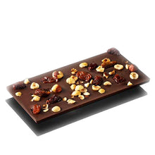 Load image into Gallery viewer, Gut aufgelegte dunkle Schokolade mit Haselnüssen und Jumbo-Rosinen
